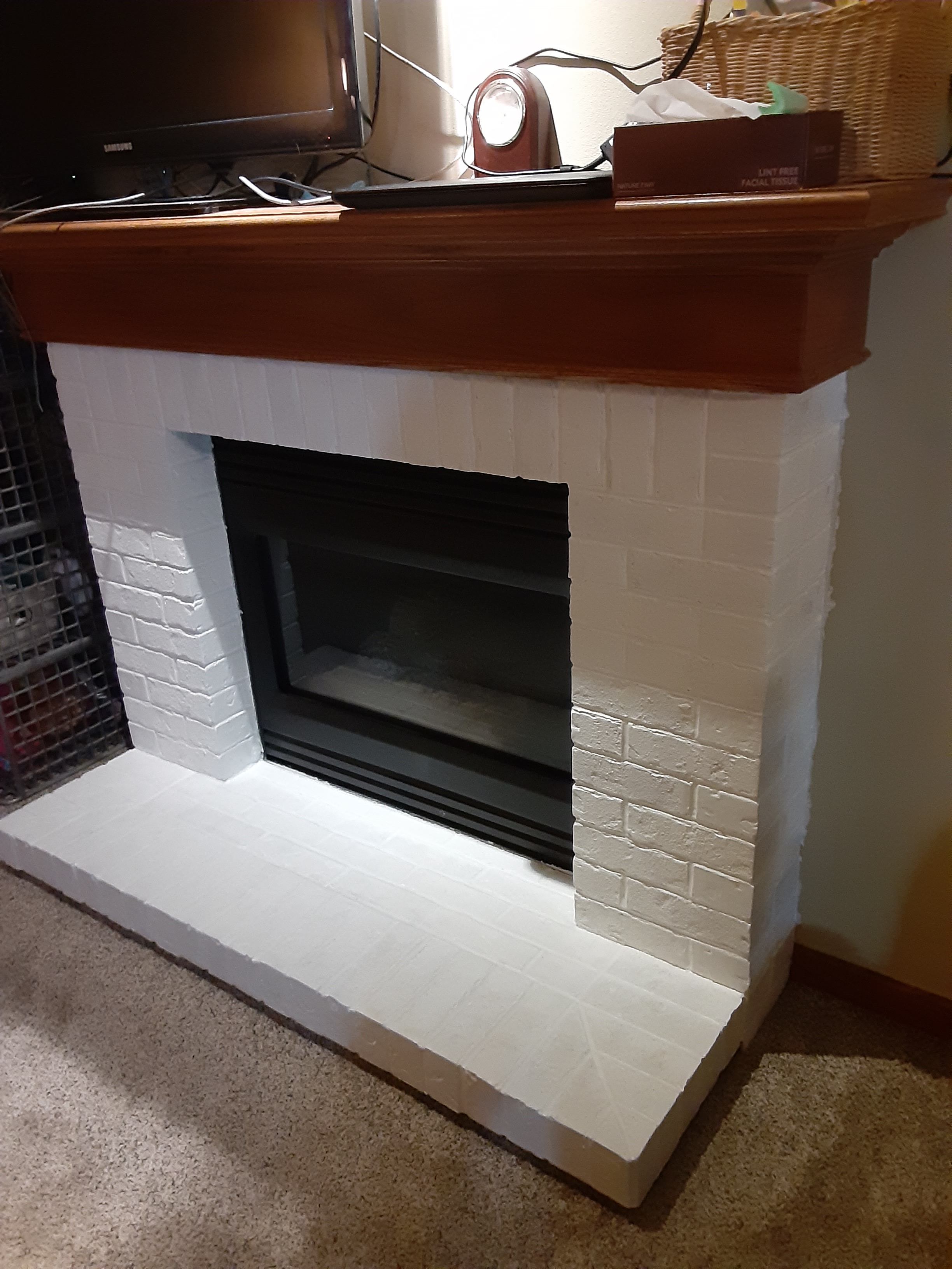 How to whitewash a1990’s brown brick fireplace